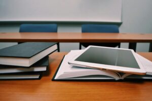 stack of books on desk